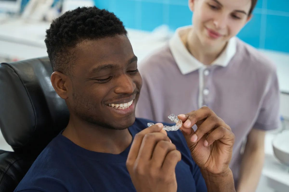 Clean Invisalign clear aligner trays in a case