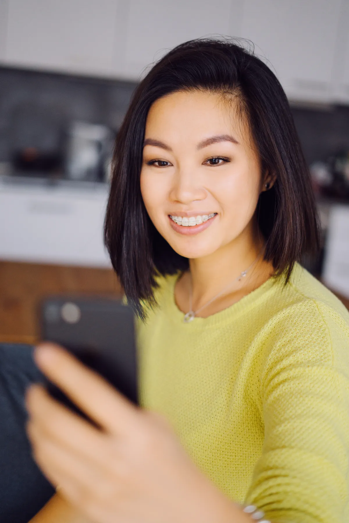 A patient at a ceramic braces adjustment appointment