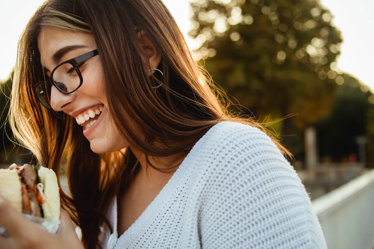 A patient confidently going about everyday life during lingual braces treatment
