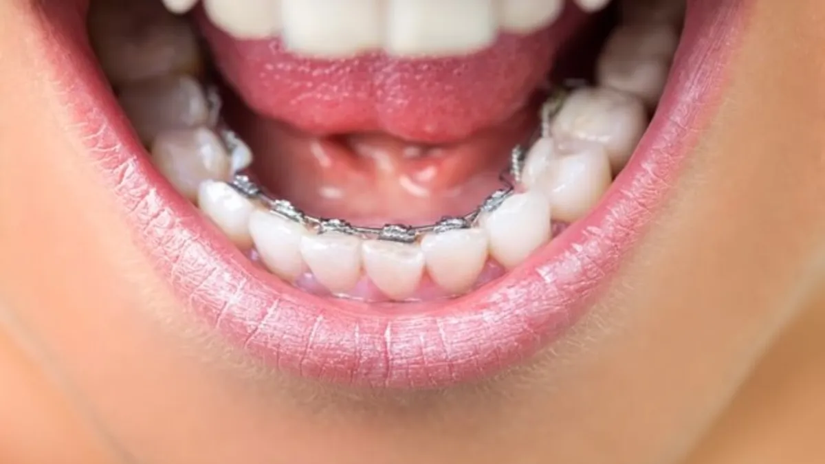 A patient talking with their orthodontic specialist at a consultation