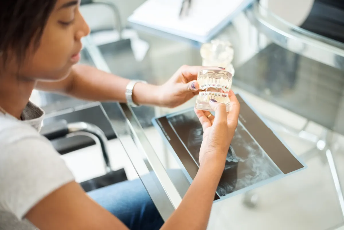 A patient at a braces adjustment appointment